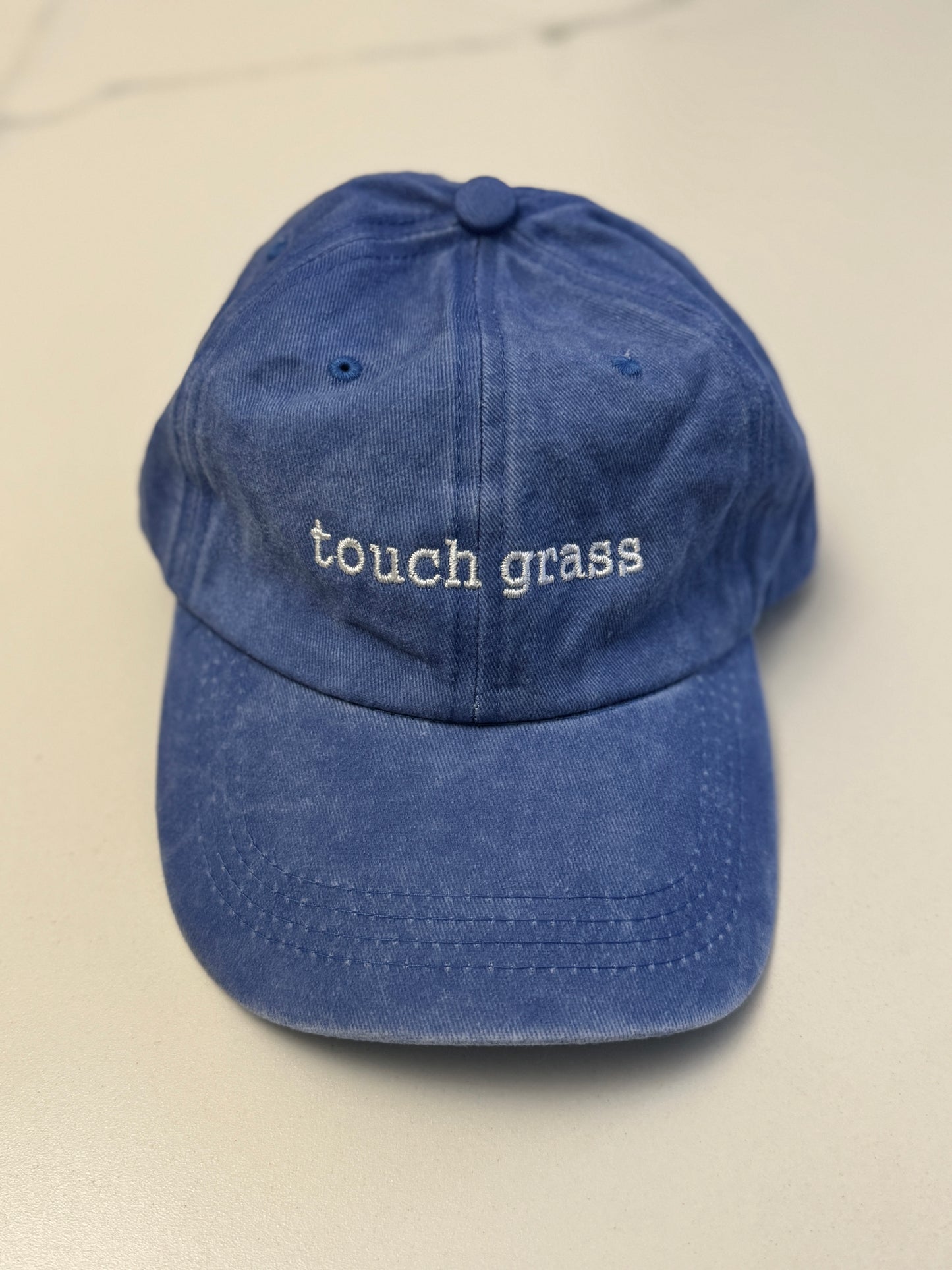 Touch grass cap