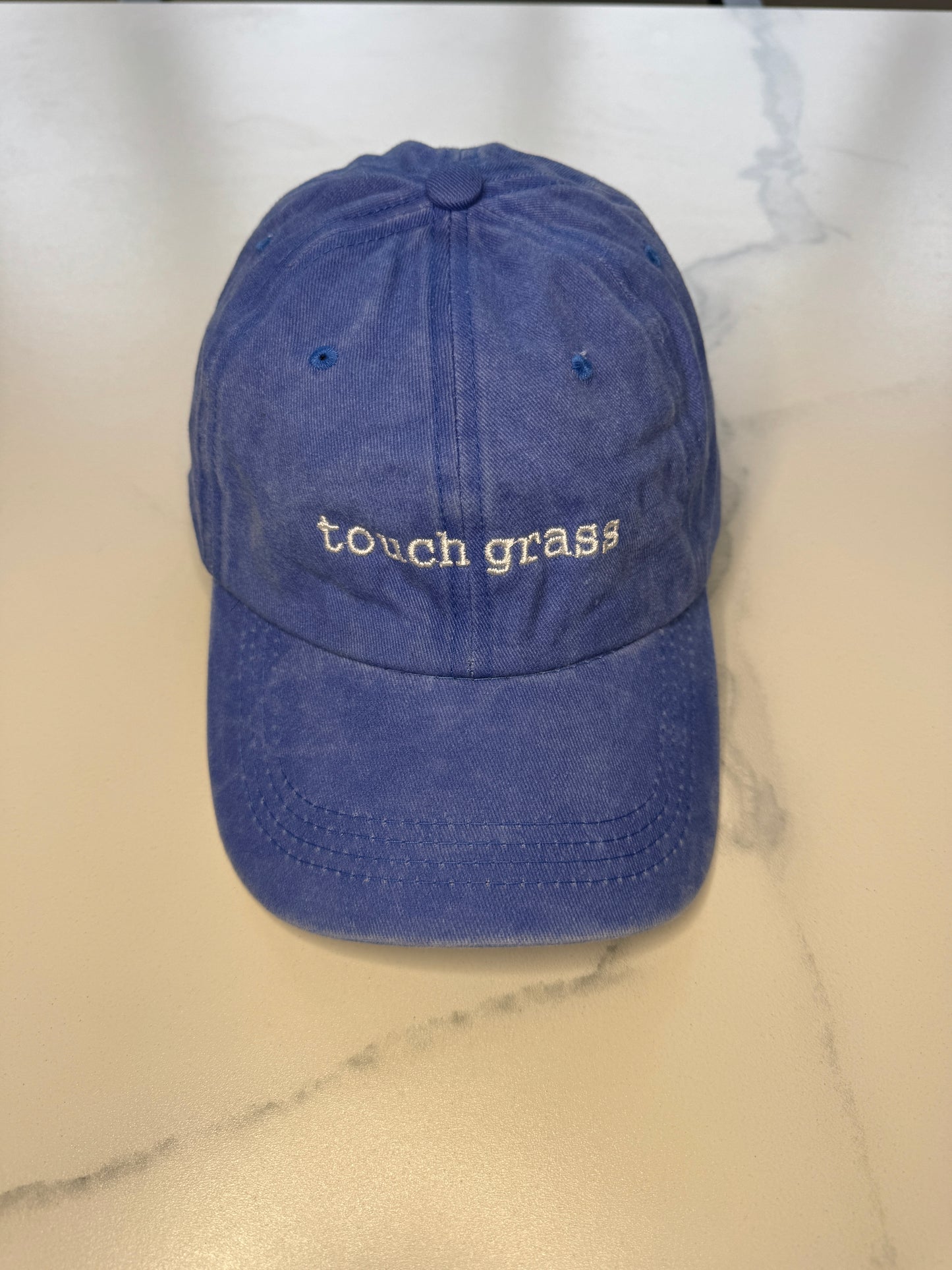 Touch grass cap