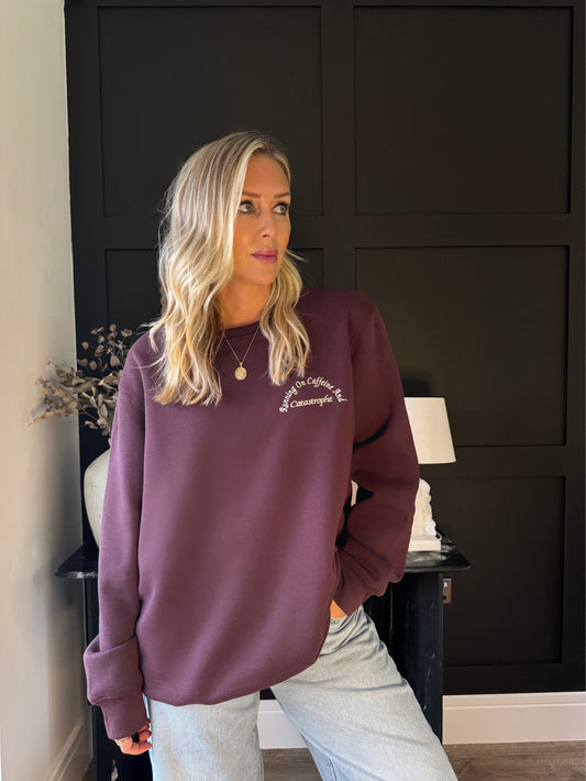 Running On Caffeine And Catastrophe Sweatshirt