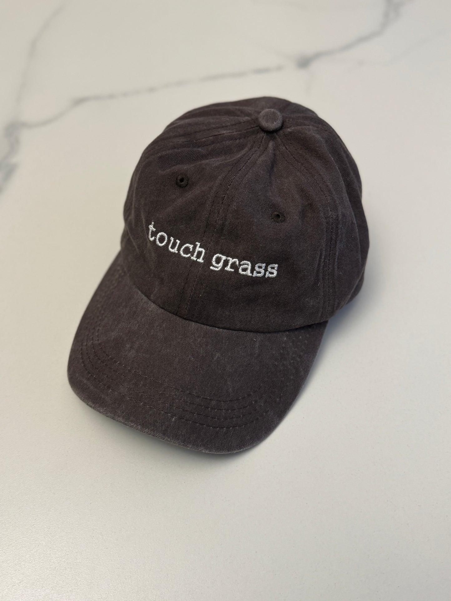 Touch grass cap