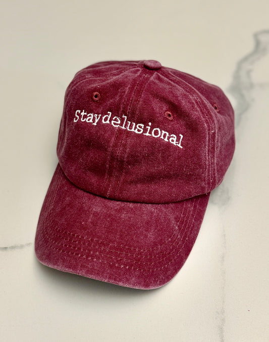 Stay delusional cap